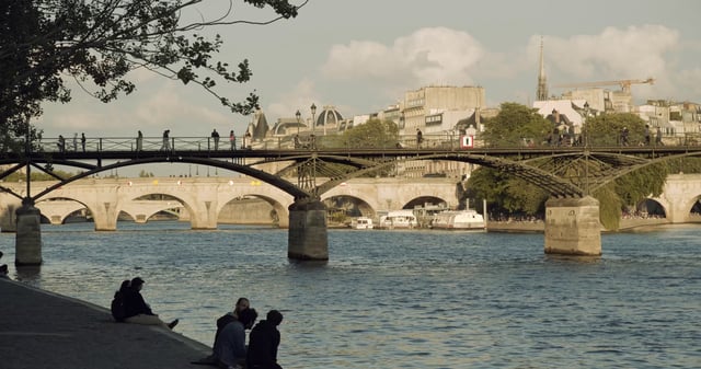 People on Quai de la Seine Bridge in Paris