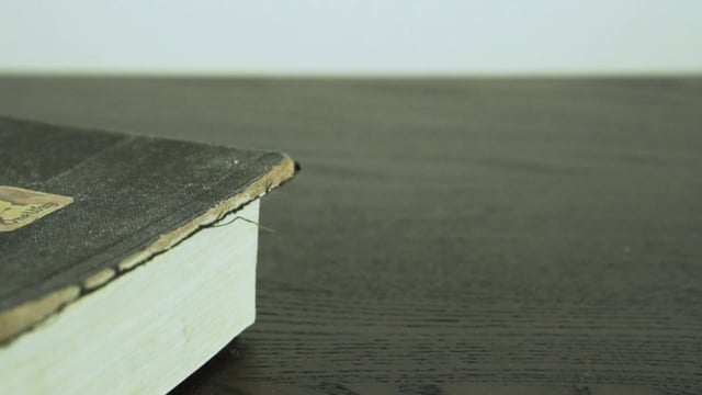 Old Bible covered in dust