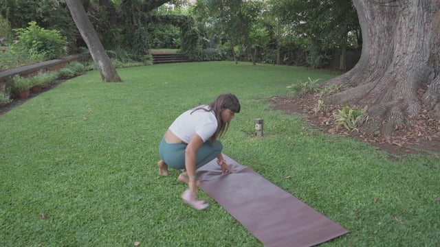 Girl cleaning her yoga mat