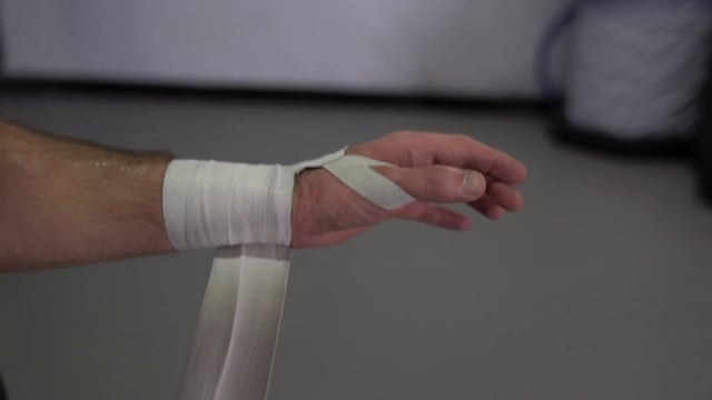 Wrapping hand with a bandage