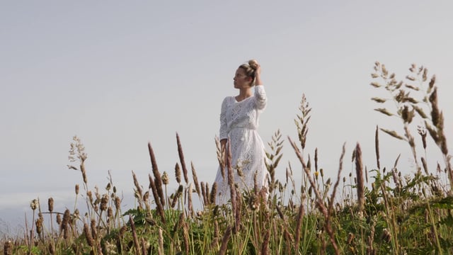 Woman posing in a field