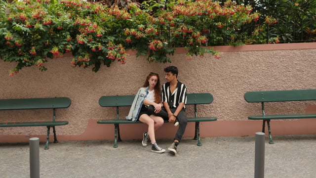 Couple posing on a bench
