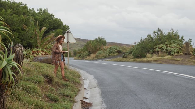 Woman crossing a road