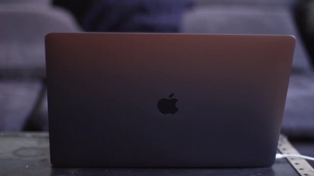 Behind a Macbook