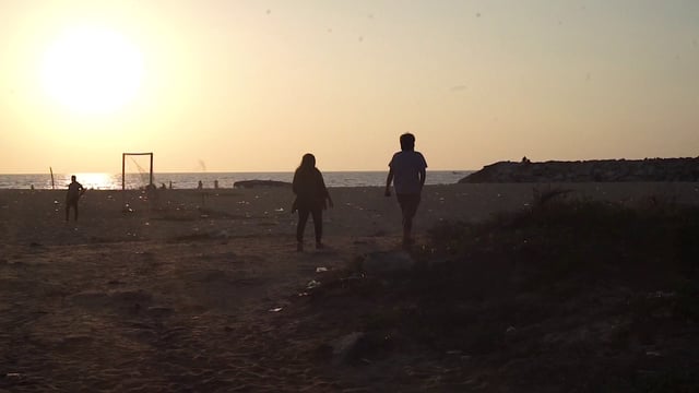 Walking along a beach in India