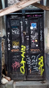 Door covered in graffiti 