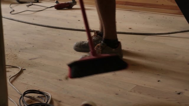 Sweeping sawdust 