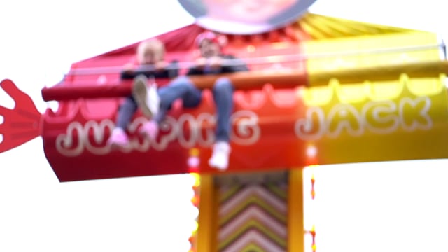 Children on amusement park ride