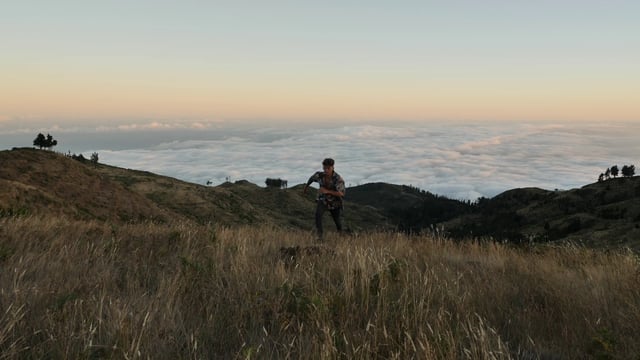 Man running up a hill