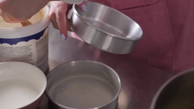 Greasing a baking dish with margarine