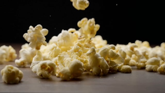 Close-up of popcorn falling on a table