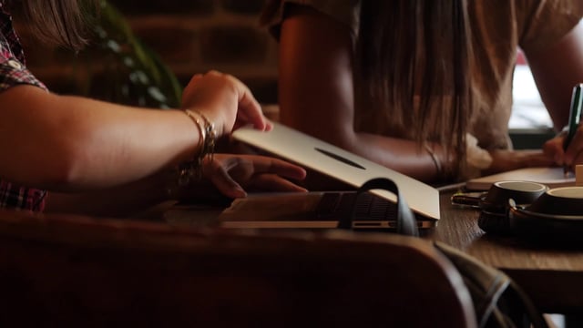 Student studying in a coffee shop
