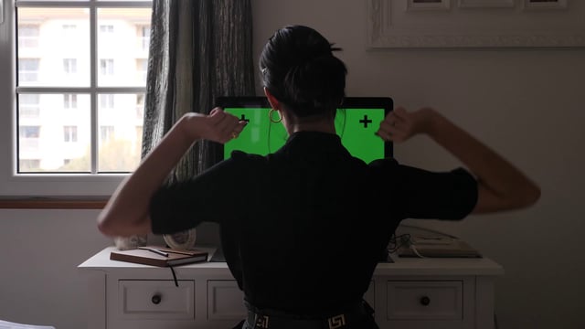 Stretching in front of computer