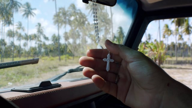 Crucifix hanging in a car