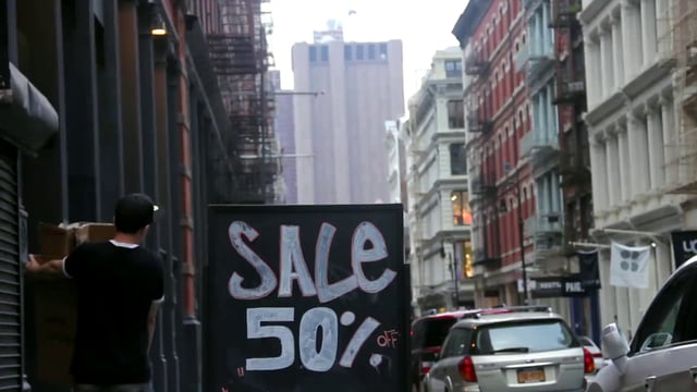 50% sale sign on the street