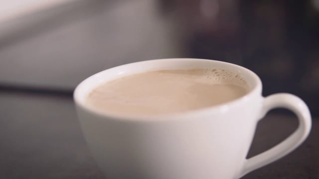 Taza de cafe caliente
