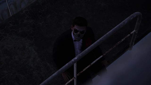 Creepy man looking up at the camera