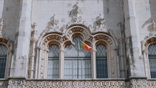 Portugal's flag on the Jeronimos Monastery
