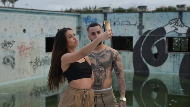 Woman taking selfies with her boyfriend