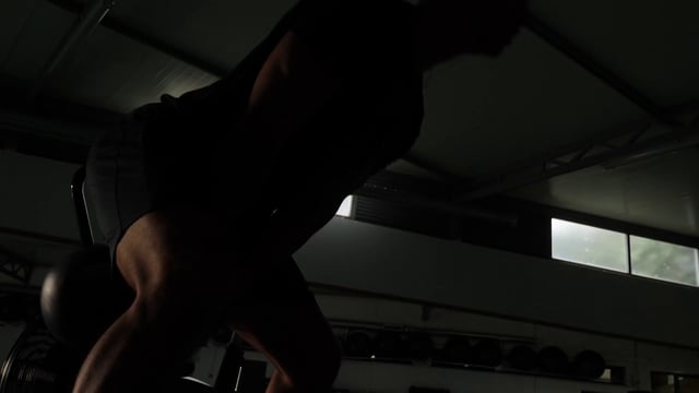 Man lifting a kettlebell