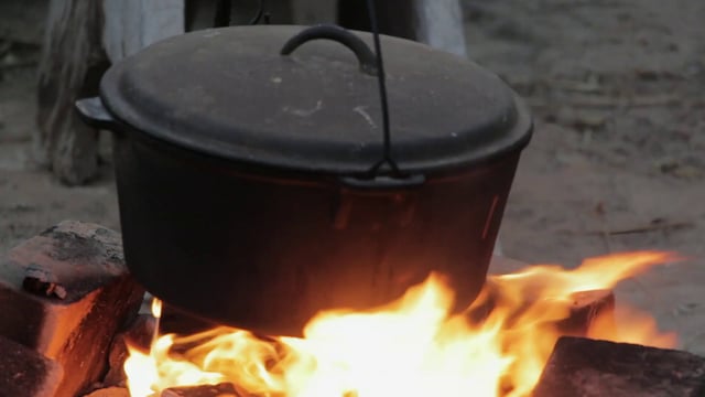 Cooking pot over the fire