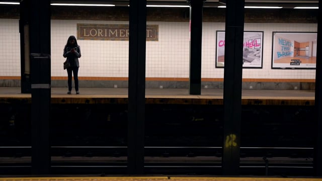 Woman waiting for the subway