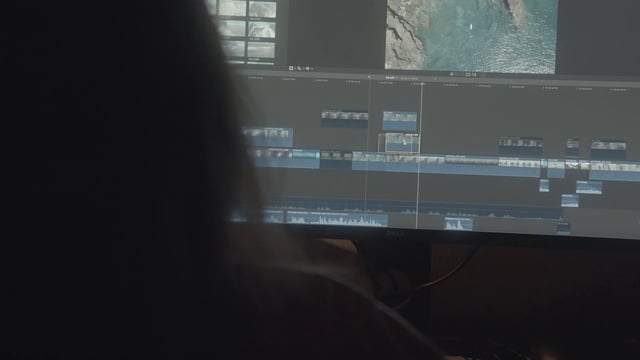 A woman busy in the process of video editing 