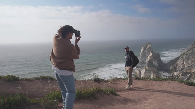 Friends Taking Photos On The Edge Of A Cliff   Free Stock Video Footage