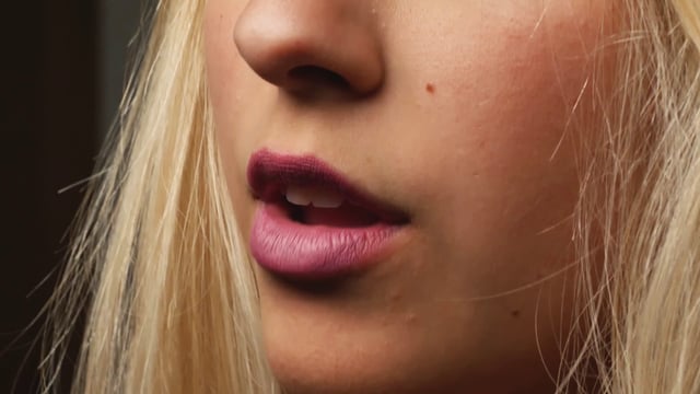 Taking off pink lipstick 