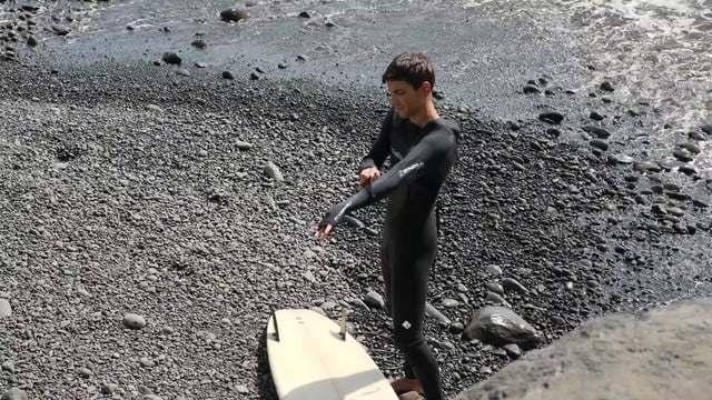 Man getting ready to surf