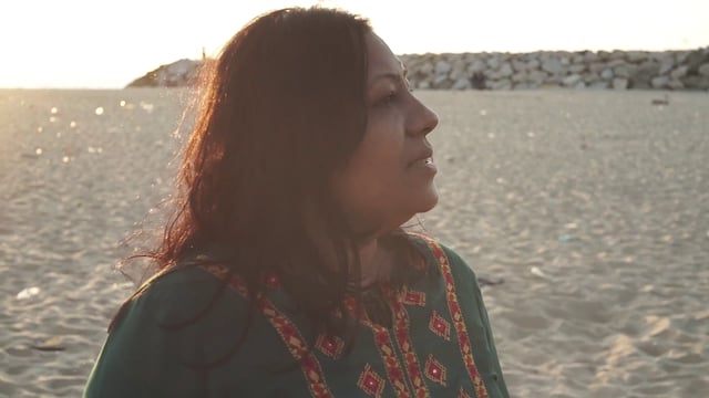  Woman on a beach in India 