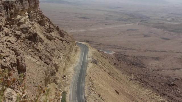 Car driving through the desert 