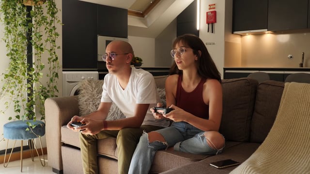 Couple plays a video game