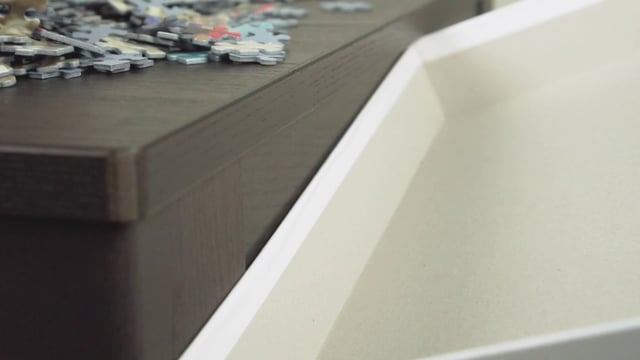 Putting puzzle pieces in a box