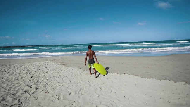 A boy surfing 