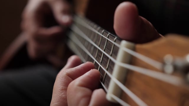Close-up playing the ukulele