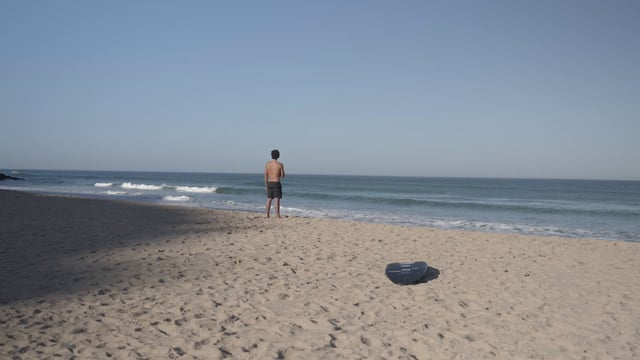 A man observing the sea