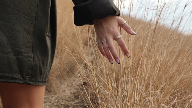 Woman touching the grass