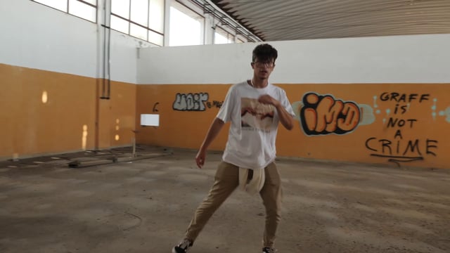 Dancing in room with graffiti