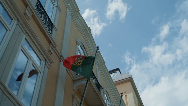 A building with the national flag of Portugal