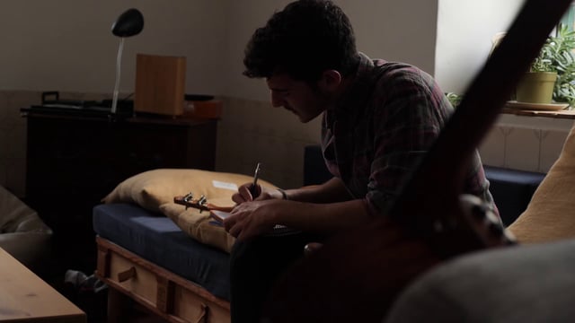 Man writing a song