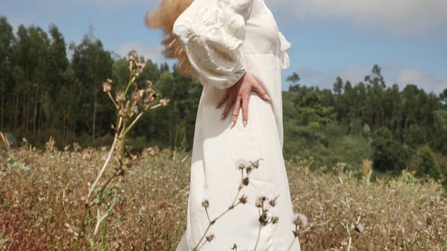 Model posing in a field