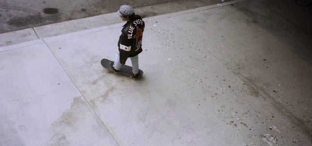 Doing a double twist on a skateboard