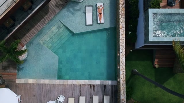 Outdoor pool near a villa