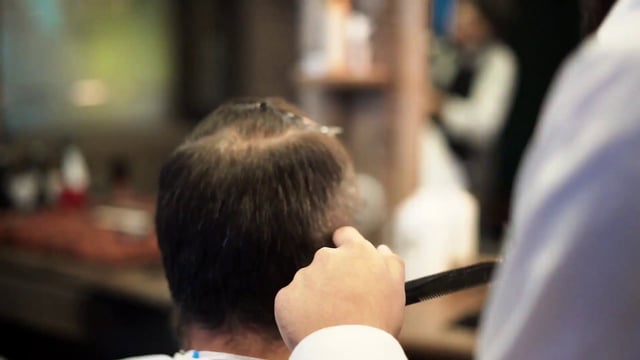 Cutting a man's hair 